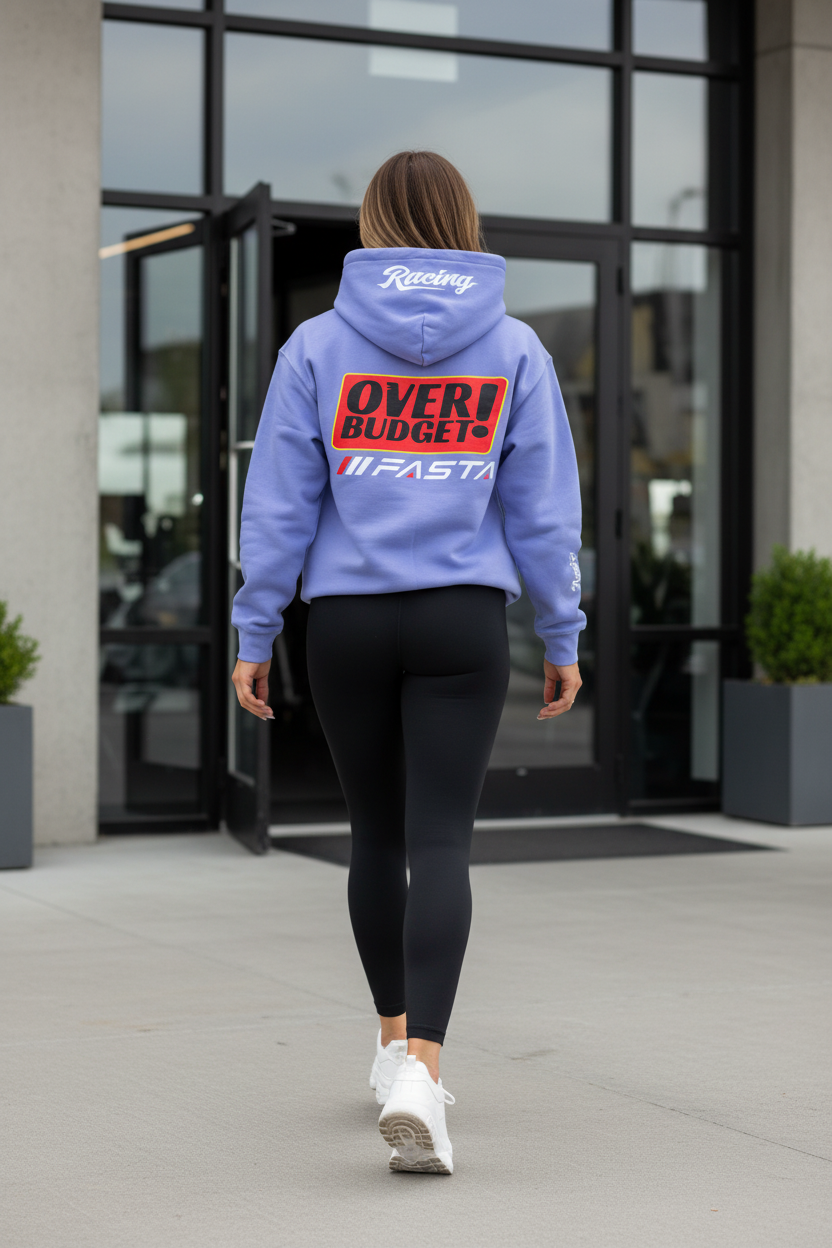 Female model wearing Overbudget Fasta violet hoodie coming out of gym